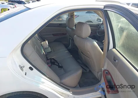 2004 Toyota Camry Le z USA, uszkodzony, nr VIN JTDBE32K940269243